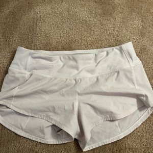 white lululemon shorts